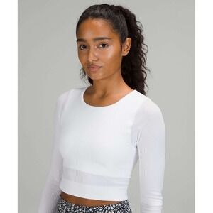 Lululemon Ebb to Street Long Sleeve
White size 10 NEW activewear